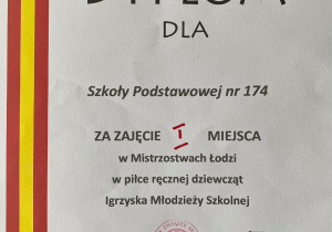 Dyplom za zajęcie pierwszego miejsca w Mistrzostwach Łodzi w piłce ręcznej dziewcząt przyznany Szkole Podstawowej numer 174 w Łodzi.